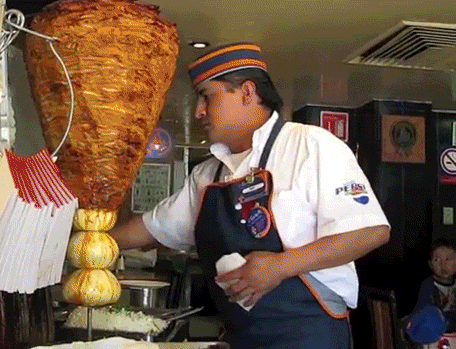 Making tacos al pastor - Imgur